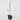 Decorative item with a black base and gold stand on a white background