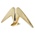 Gold bird-shaped decorative bookend on a white background