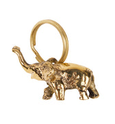 Gold elephant keyring on a white background