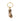Gold keychain shaped like a peanut on a white background