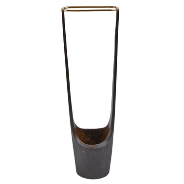 Tall, thin metal vase with a cylindrical base on a white background