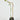 Black vase with a plant on a white background