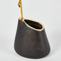 dark brass vase detail