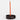 Orange pencil with a black holder on a white background