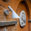 Arne Jacobsen 'AJ 50' Outdoor Wall Light for Louis Poulsen Two Enlighten white outdoor lifestyle with cord 