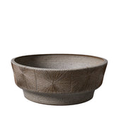 Ceramic low planter with textured design on a white background by earthgender