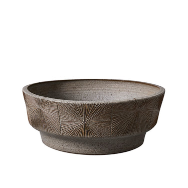 Ceramic low planter with textured design on a white background by earthgender