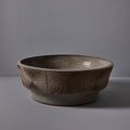 earthgender sunburst etching detail ceramic planter cressey maxwell on grey background
