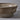 Ceramic sunburst planter with textured design on a gray background