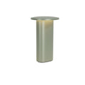 Metallic cylindrical table lamp on a white background
