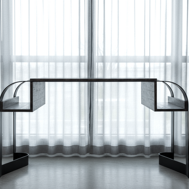 Modern console table or desk with glass panels against a curtain backdrop