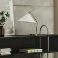 Gräshoppa Table Lamp in Brass with Canvas Shade by Greta M. Grossman for GUBI Two Enlighten lifestyle bookcase
