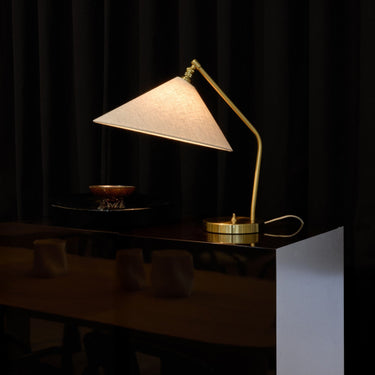 Gräshoppa Table Lamp in Brass with Canvas Shade by Greta M. Grossman for GUBI Two Enlighten lit lifestyle