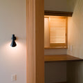 Arne Jacobsen 'AJ Wall' Indoor Light for Louis Poulsen Two Enlighten black hall lifestyle 