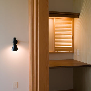 Arne Jacobsen 'AJ Wall' Indoor Light for Louis Poulsen Two Enlighten black hall lifestyle 
