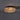 Ceiling light fixture with ribbed glass design on a dark background