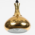 Gold pendant light with a white background