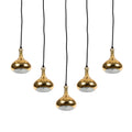 Five gold pendant lights with black cords on a white background