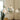 Modern geometric cirque and doo-wop white pendant lights hanging in a room with framed pictures on the wall. 'Cirque' Pendant Lamp by Clara von Zweigbergk for Louis Poulsen Two enlighten