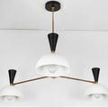 Modern chandelier with white shades and black accents on a white background