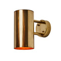 raw brass cylindrical indoor outdoor wall light on white background