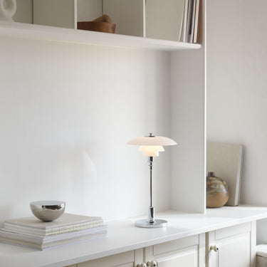 PH 2/1 portable chrome table lamp louis poulsen poul henningsen two enlighten bookshelf lifestyle