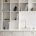 PH 2/1 portable brass able lamp louis poulsen poul henningsen two enlighten lifestyle bookshelf