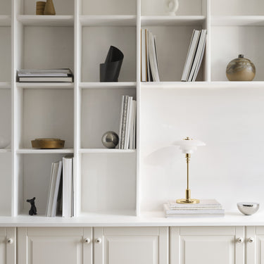 PH 2/1 portable brass able lamp louis poulsen poul henningsen two enlighten lifestyle bookshelf
