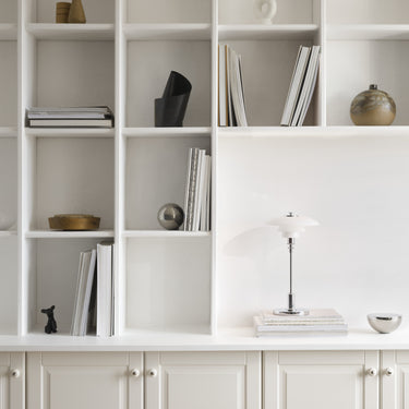 PH 2/1 portable chrome table lamp louis poulsen poul henningsen two enlighten bookshelf lifestyle