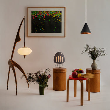 indoor black tratten pendant akari lamp artek stool and rispal mantis lamp two enlighten