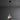 Green verdigris tratten pendant light with copper interior against a gray background