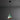 Green verdigris tratten pendant light with copper interior against a gray background