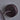 Close-up of a bronze patina lamp on a gray background