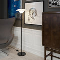 Modern black floor lamp in a stylish room at the Darling Copenhagen with art and furniture.
