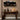 yellow metal lamp on rustic table bar table