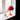 Red table lamp on a windowsill with natural light