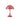 Red or coral colored 70s style table lamp on a white background