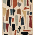 Colorful abstract patterned  modern kilim rug on a beige background