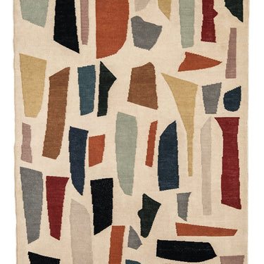 Colorful abstract patterned  modern kilim rug on a beige background