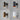Various wall lights in different finishes on a gray background