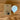 Tala Sphere II light bulb on a wooden surface