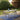 Tom Dixon Modern Outdoor patio set with table and chairs on a wooden deck