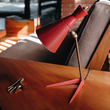 stilux milano red midcentiry table lamp on warm wood table schaffer house los angeles