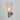 Pietro Chiesa for Fontana Arte Wall-mounted light fixture with a cone-shaped glass shade on a plain background for Two Enlighten 