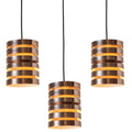 Three cylindrical pendant lights with stacked metallic rings on a white background