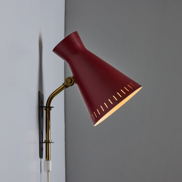 V3454 1950s Perforated Red Diabolo Plug-In Wall Lamp Attributed to Mauri Almari for Two Enlighten