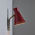 V3454 1950s Perforated Red Diabolo Plug-In Wall Lamp Attributed to Mauri Almari for Two Enlighten
