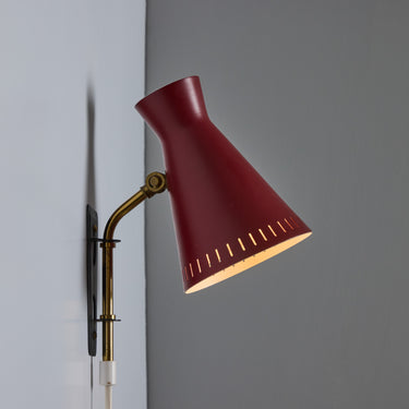 V3454 1950s Perforated Red Diabolo Plug-In Wall Lamp Attributed to Mauri Almari for Two Enlighten