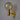 Gold wall sconce with a clear glass globe on a gray background