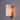 Wall-mounted light fixture with a soft glow on a gray wall
